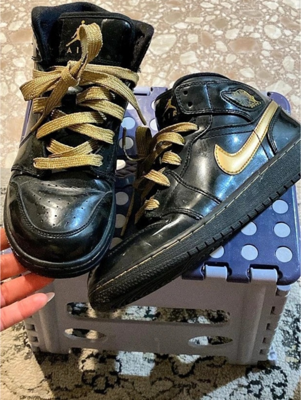 Nike Air Jordan 1 High-Top Sneakers in Black & Gold